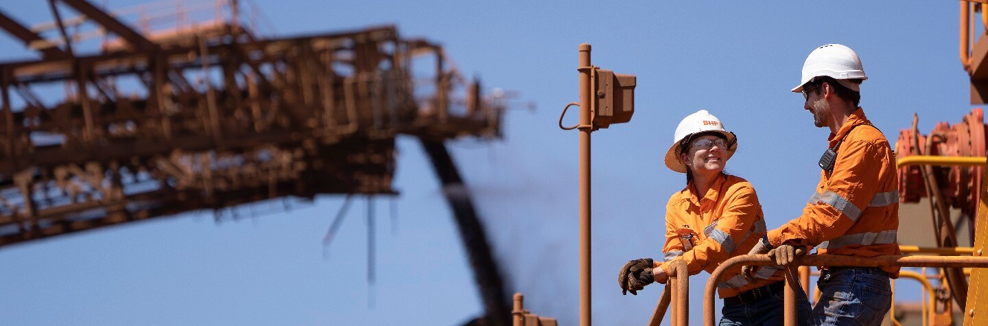 Two employees at Minerals Australia