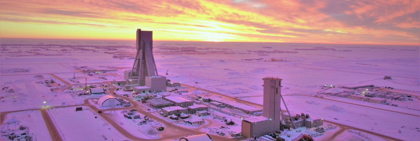 aerial shot of jansen potash mine with sunrise and purple skies