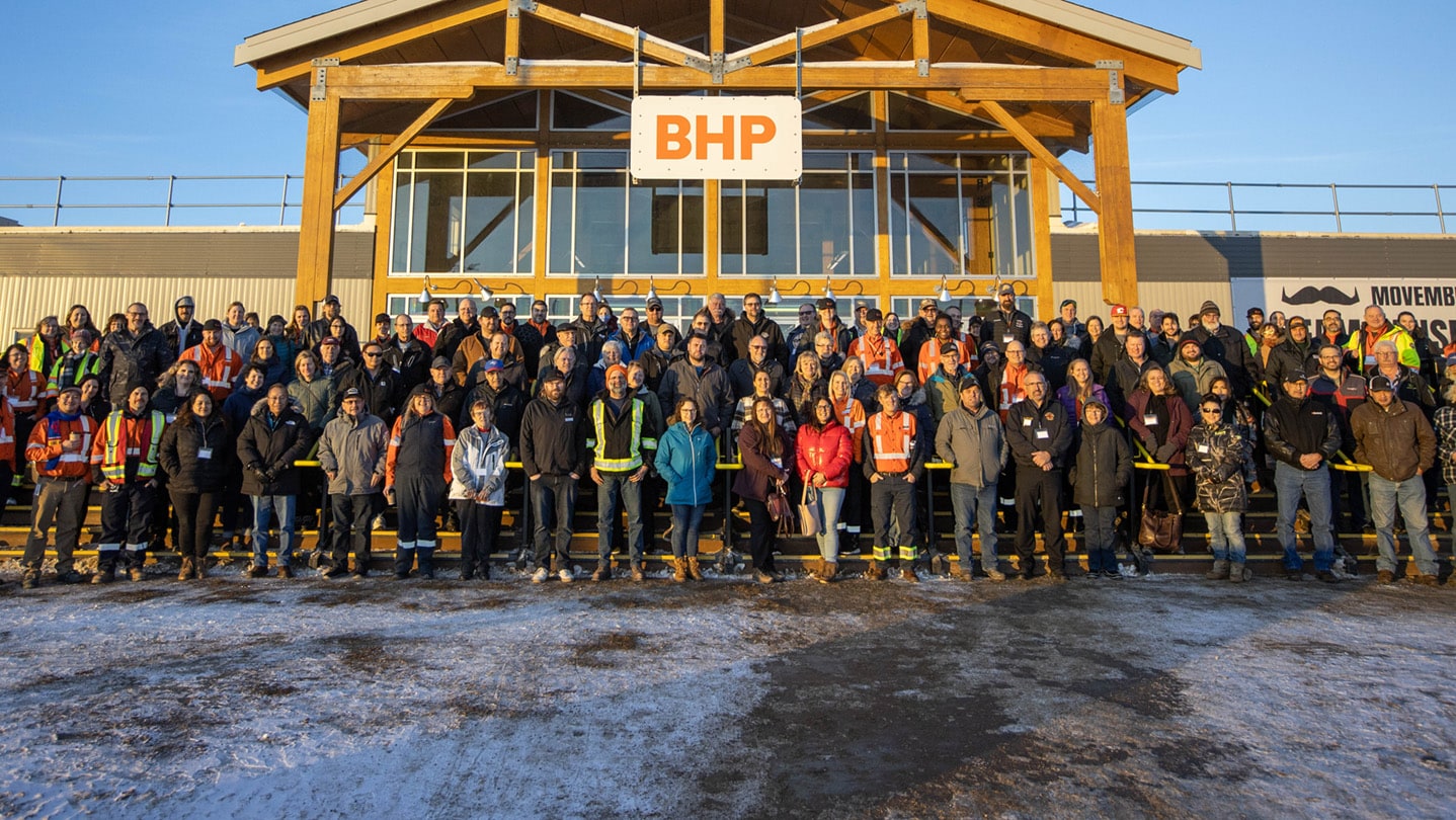 Team BHP Jansen outside of main building smiling in early morning sun
