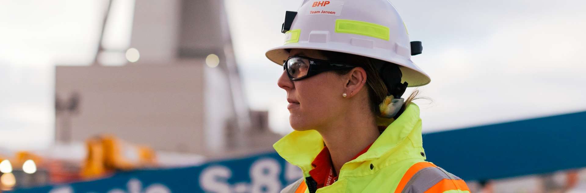 person looking into distance on site