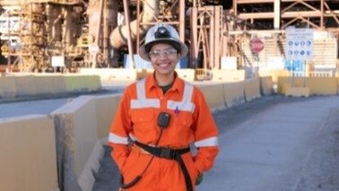 Woman, hard hat, mining