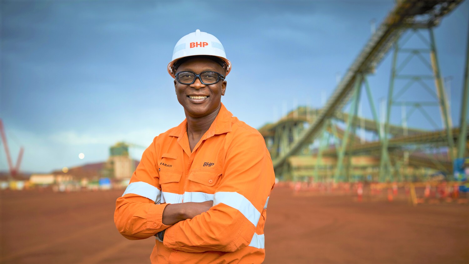 Man in front of conveyor