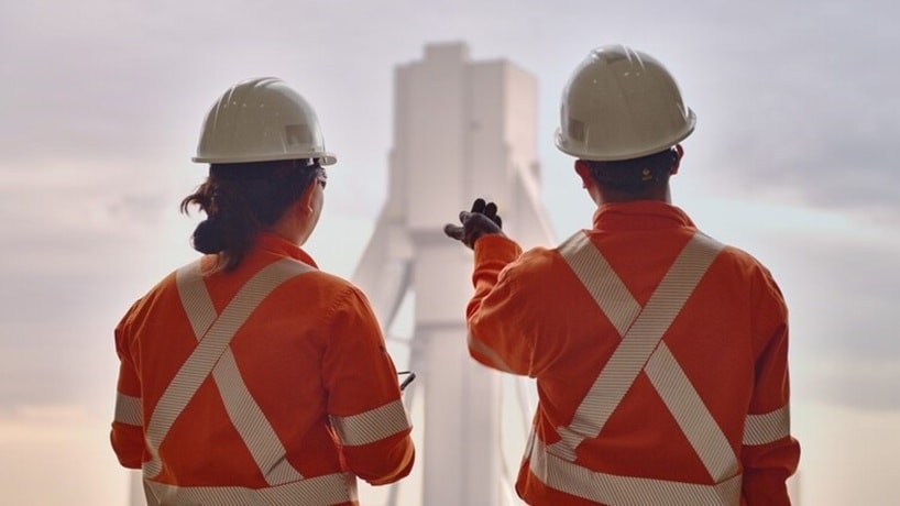 Two people in PPE