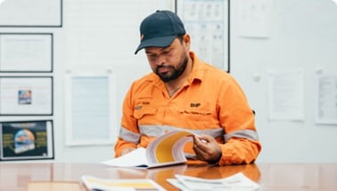 persopn flipping through book