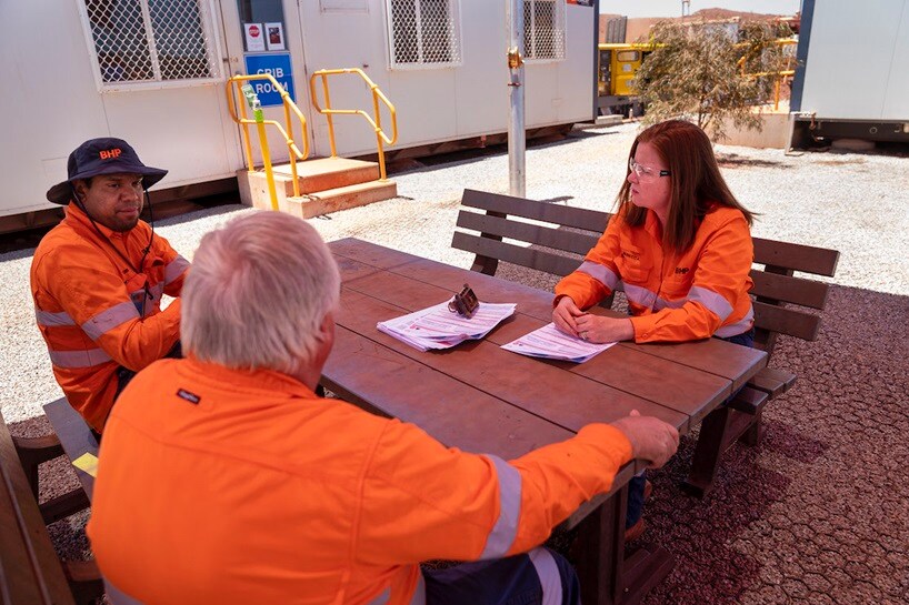 Workers meeting at table