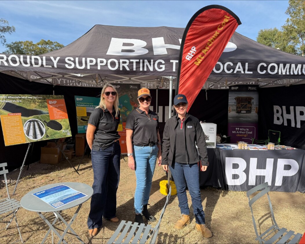 3 BHP Mt Arthur Coal representatives standing in front of the BHP stand at Tocal Field Days