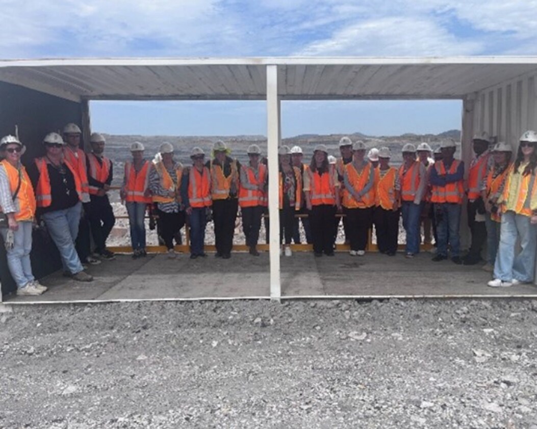 Group of people gathered at a look out at Mt Arthur Coal