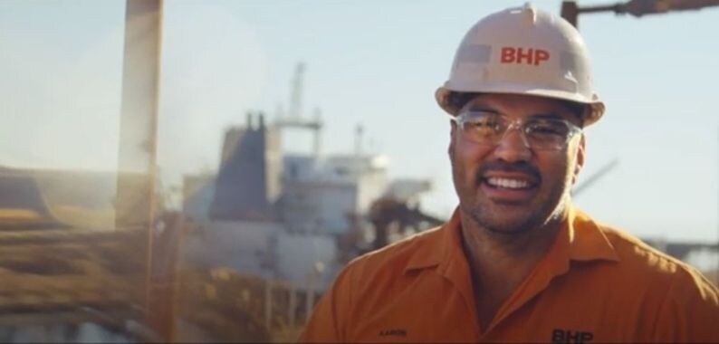 smiling employee mining