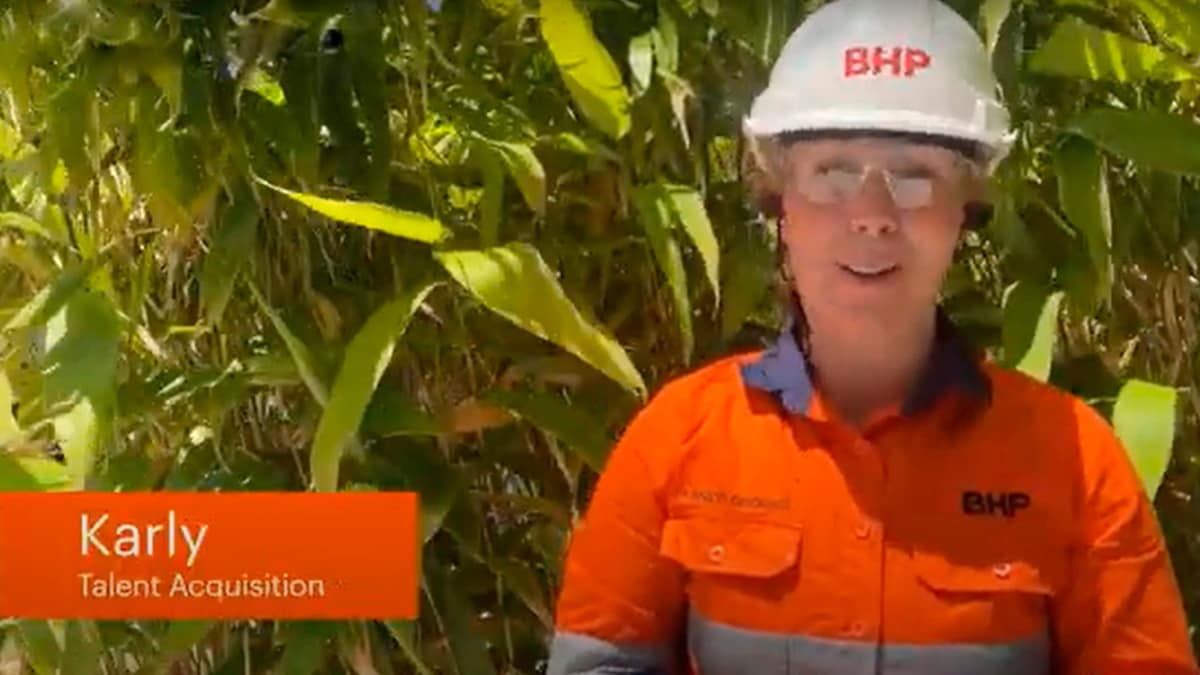 Karly George Talent acquisition specialist shown in field with BHP PPE