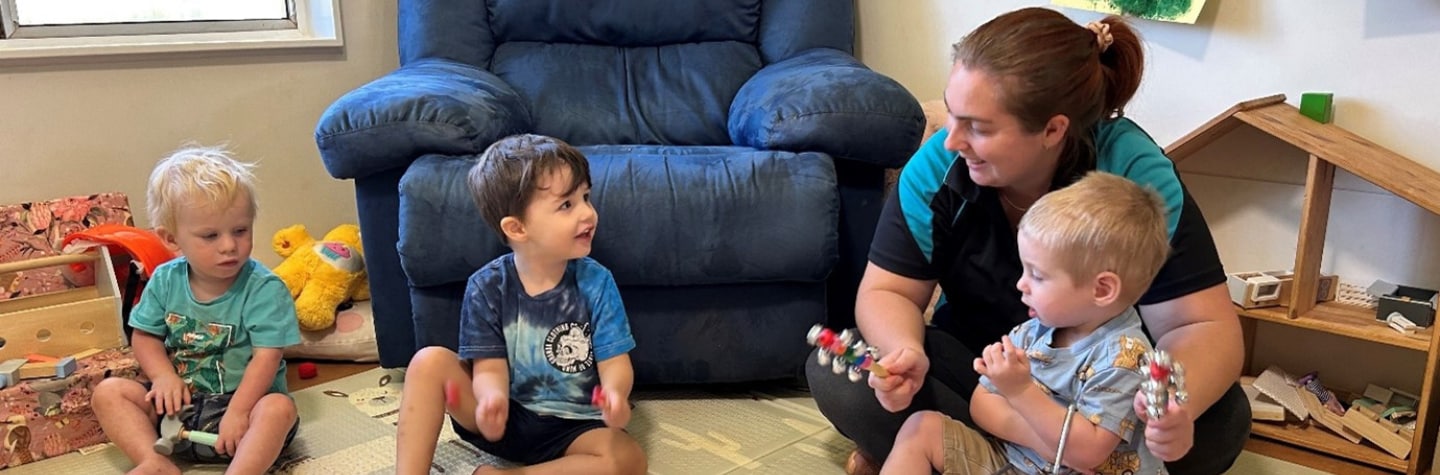 Childcare worker looking after toddlers