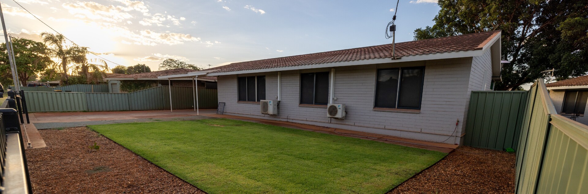 BHP-refurbished Newman home featuring a spacious fenced yard, low-maintenance landscaping and fresh exterior finishes.