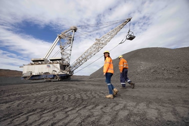 BMA site with man and woman and digger