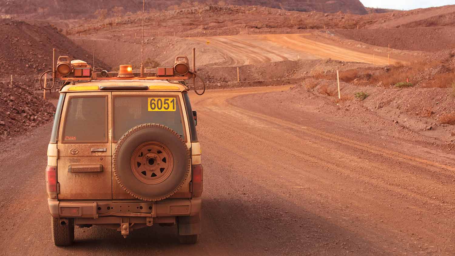 Light vehicle driving through site