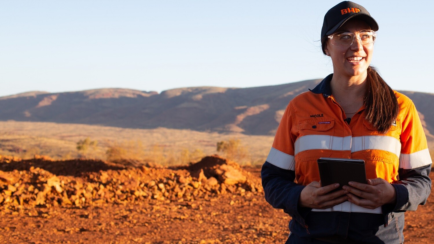 Image of a miner at the South Flank iron ore mine in the Pilbara