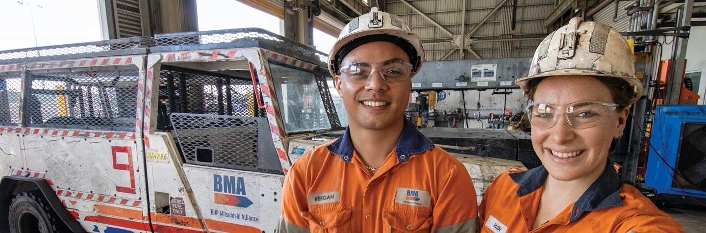 Apprentices smiling at camera