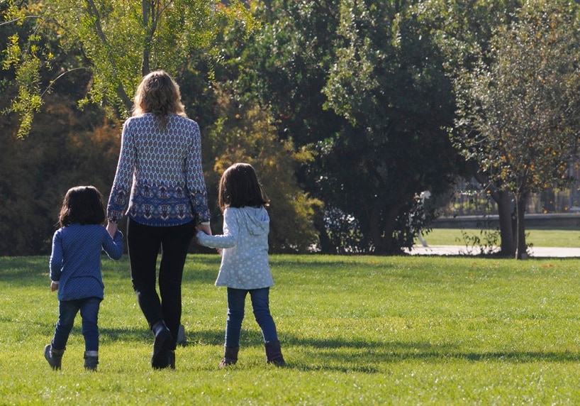 Woman walking with children
