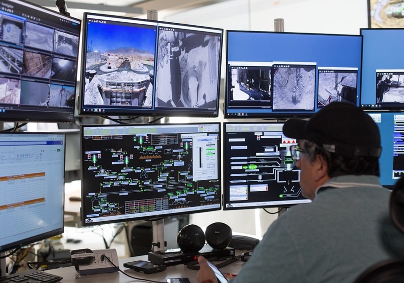 Person looking at computer screens
