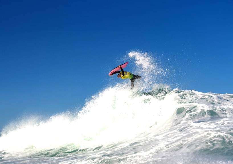 Body boarder riding a wave