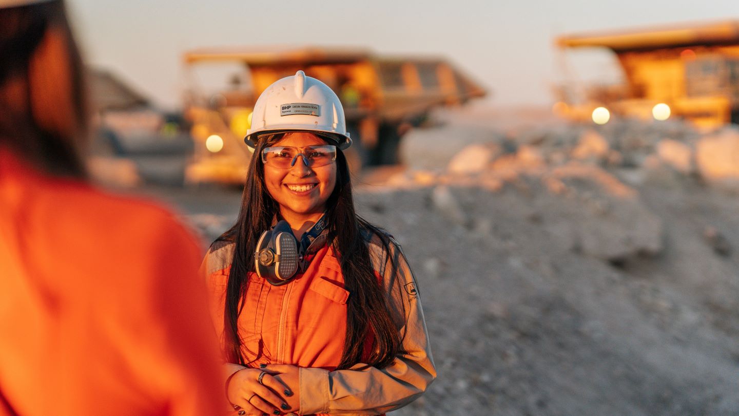 Carolina wearing a hard hat and PPE at Chile mine site